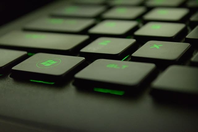 close-up of black and green keyboard